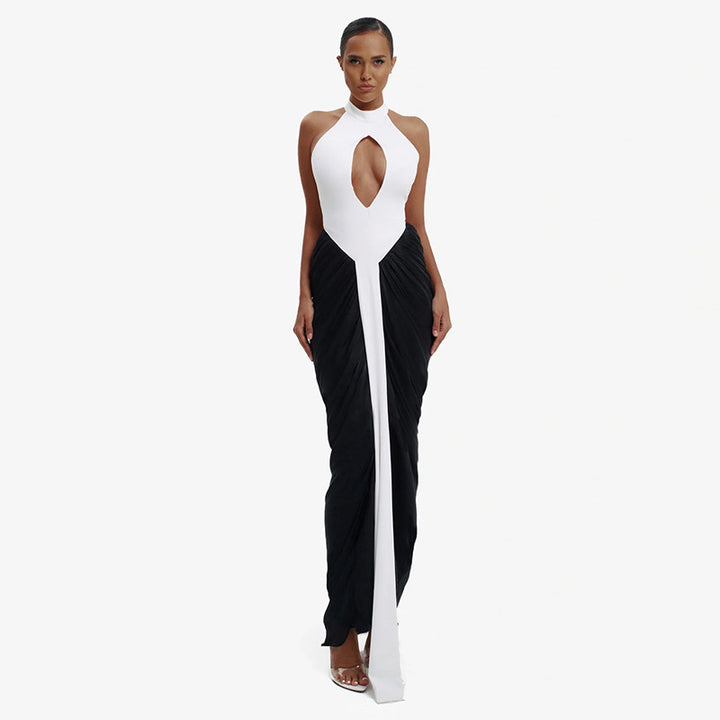 Dame maxikjole med højtstående udskæring og elegant cut-out Skovae