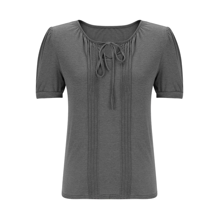 Damebluse med puffærmer og raffineret halterneck Stilla