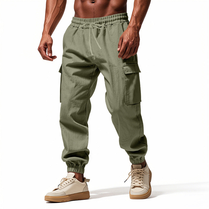 Herrer nan konisk skrånende joggere i utilitarisk stil med elastisk talje, snøre og klaplommer Skovae