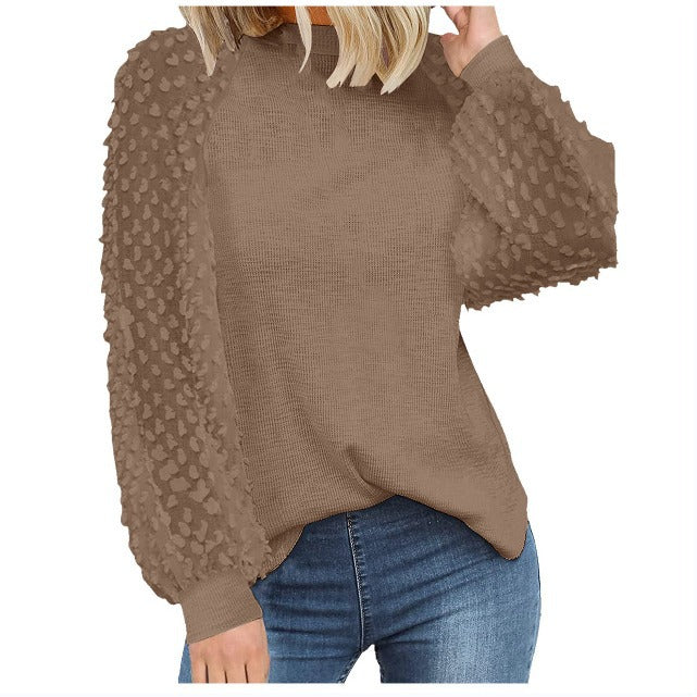 Dame strikpullover med transparente pufærmer Stilla