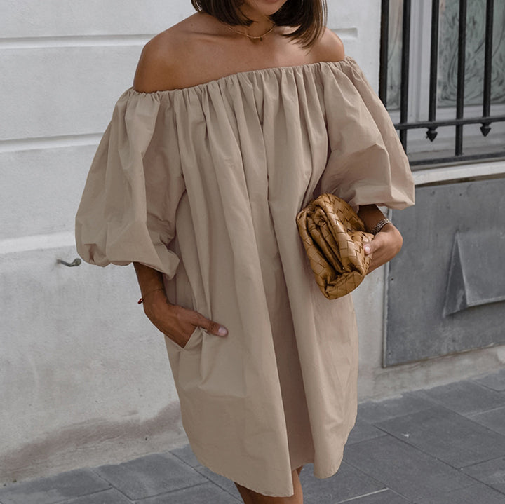 Dame Off-Shoulder Kjole med voluminøse ærmer og praktiske lommer Stilla