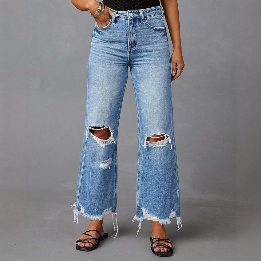 Dame flared jeans med stilfulde rifte detaljer og frynset kant Skovae
