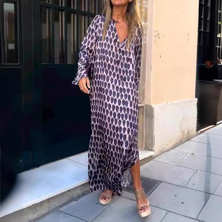 Dame Maxikjole med elegant geometrisk mønster og stilfuld V-udskæring Stilla