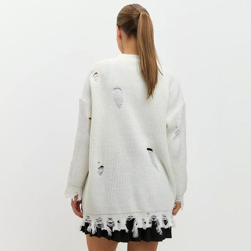 Dame oversized strikpullover med frynset detaljer og afslappet struktur Stilla