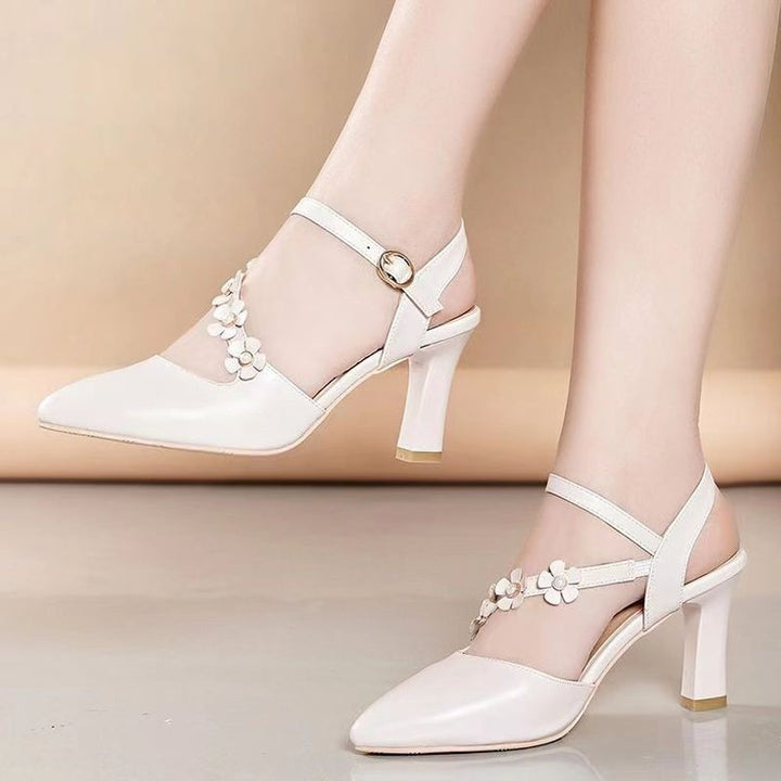 Dame Slingback-pumper med florale accenter og elegant spænde Stilla