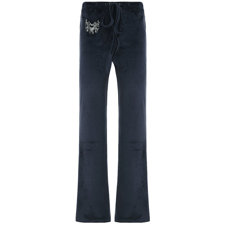 Dame-sweatpants i afslappet flared-design med trendy broderier Skovae