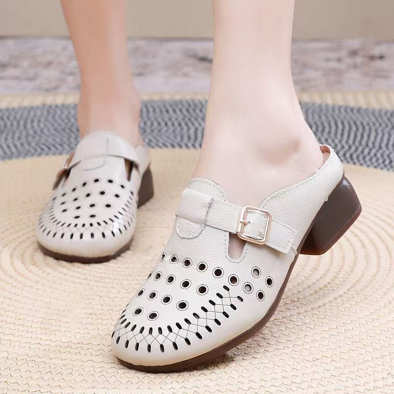 Dame Clogs med perforeret design og elegant spænde Stilla