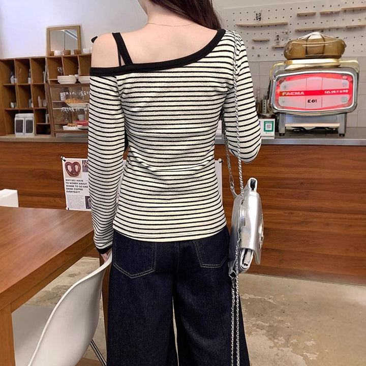 Kvinders fashionable langærmet skjorte med off-shoulder design Stilla