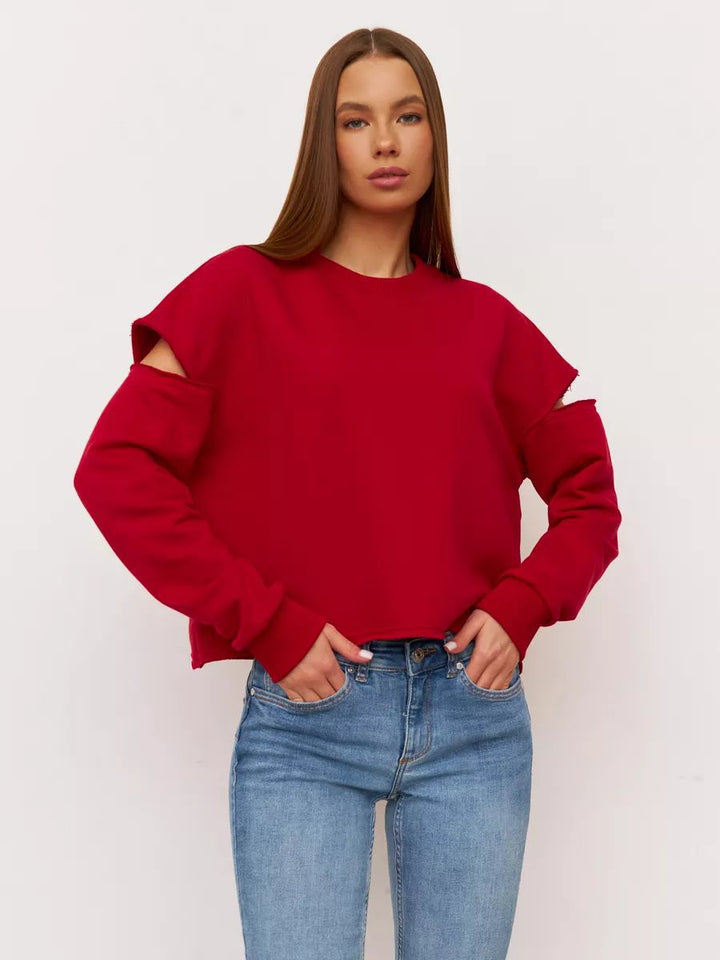 Dame afslappet sweatshirt med asymmetrisk cut-out-detaljer og oversized snit Stilla