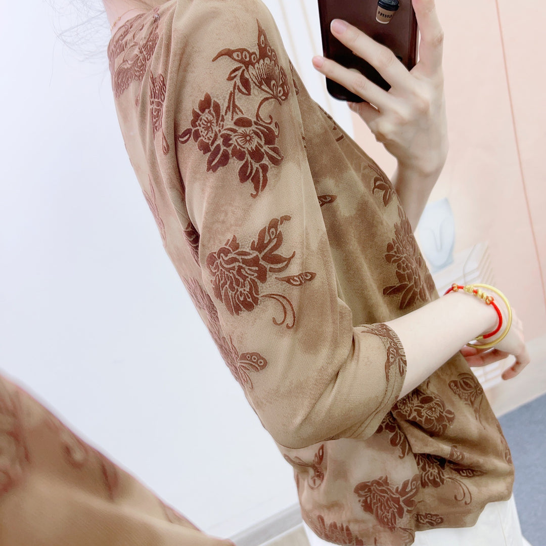 Dame mode blouse med 3/4-ærmer og blomster design Stilla