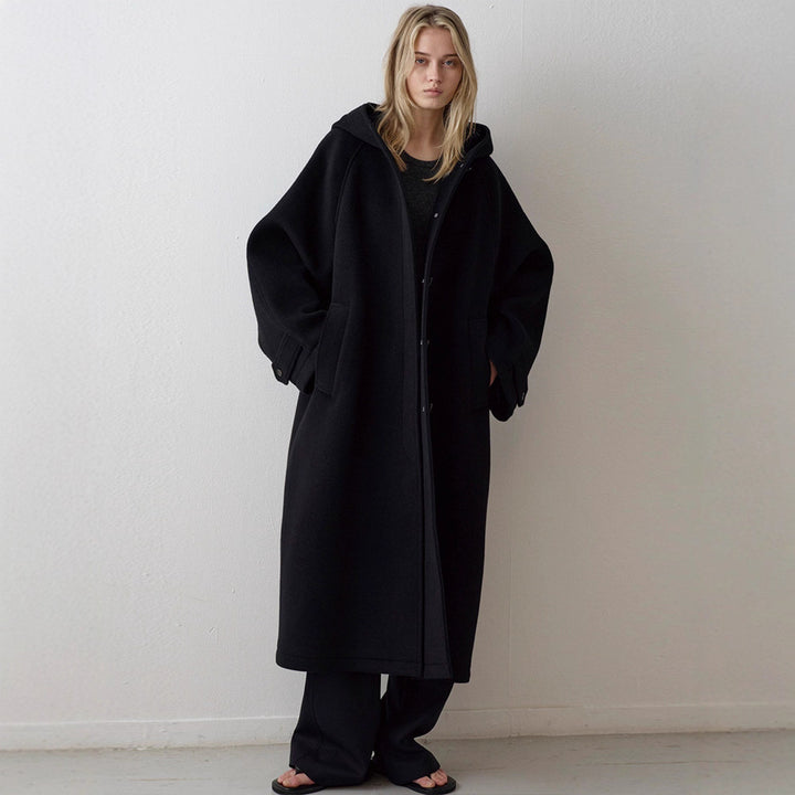 Kvinders elegante oversized jakke med hætte og praktiske lommer Stilla