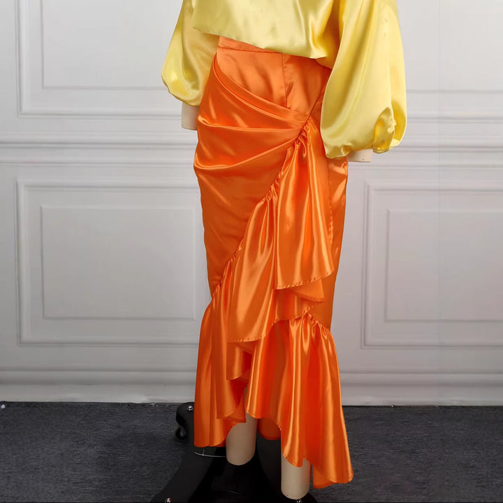 Dame Elegant satin skirt with asymmetric design and voluminous ruffle finish Skovae