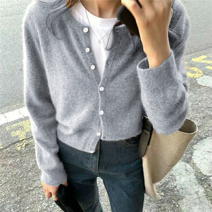Kvinders cardigan med fin tekstur og elegante knapdetaljer Stilla