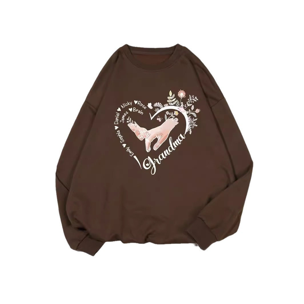Kvinder's afslappet sweater med blomstermotiver Stilla