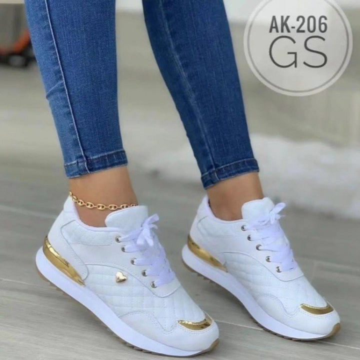 Dame sporty sneakers med elegant guldaccent og åndbart overmateriale Stilla