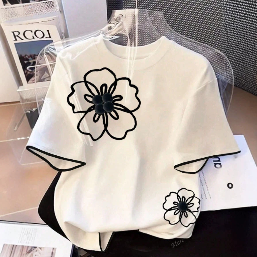 Dame T-shirt med blomstret design og løs pasform Skovae