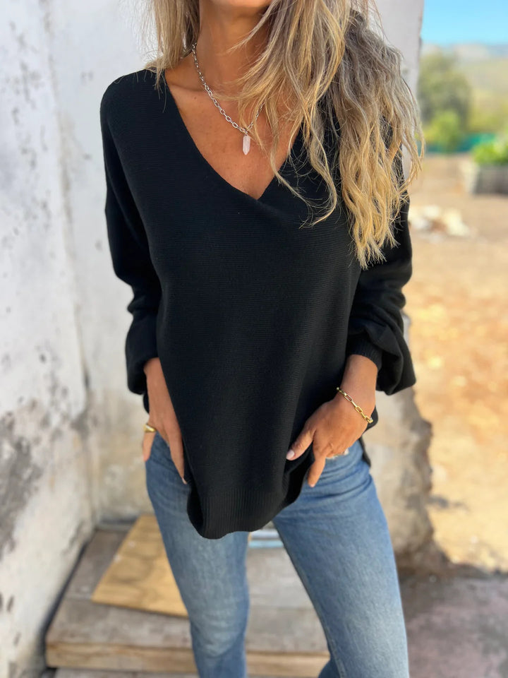 Dame afslappet sweater med dyb V-hals og lange ærmer Stilla