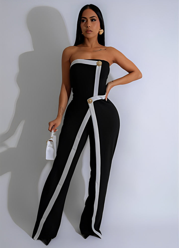 Dame-jumpsuit med elegant bustier-overdel og kontrasterende kantdetaljer Skovae