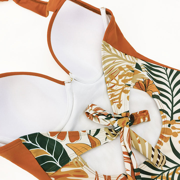 Dame éntaler badedragt med blomsterdesign og støttende bustier Skovae