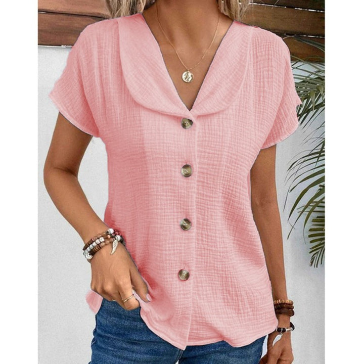 Damebluse med synlige knapper lavet af let stof Stilla