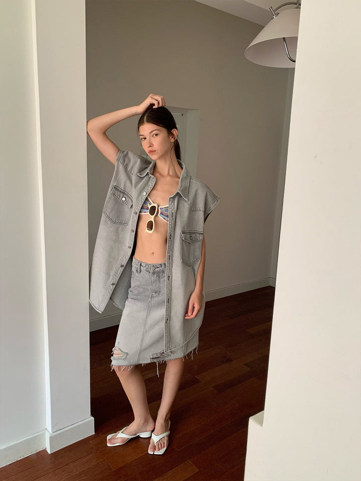 Dame Oversized Denimjakke med ærmeløst design og stilfuld frynseafslutning Stilla