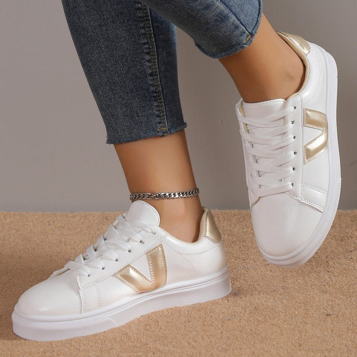 Dame Sportliche Sneakers med glitrende accenter Stilla