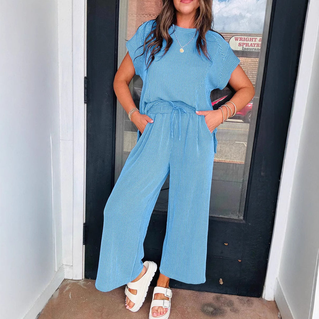 Dame afslappet strik-jumpsuit med brede ben og elastisk talje Stilla
