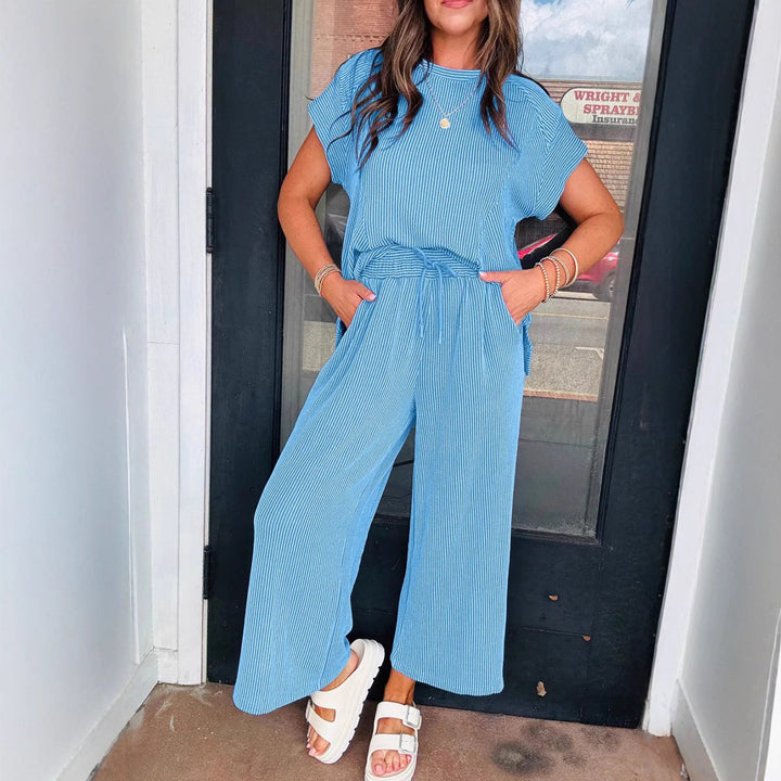 Dame afslappet strik-jumpsuit med brede ben og elastisk talje Stilla