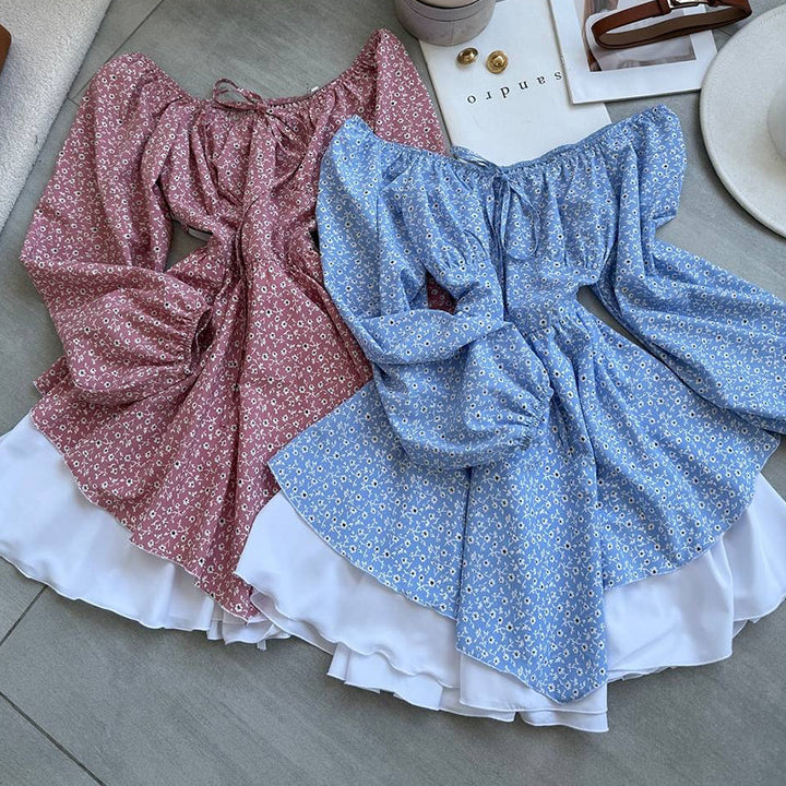Damebluse med rynket ærme og blomsterdesign Stilla