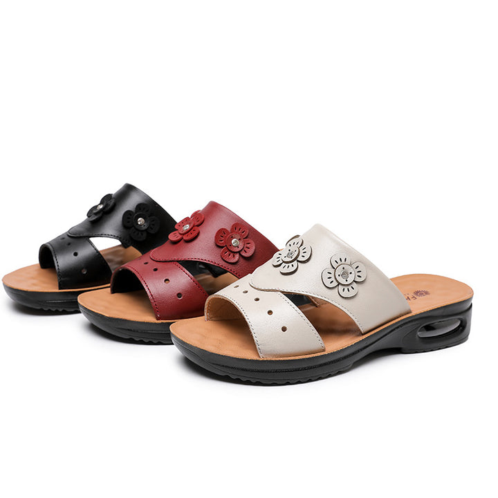Femme dekorative Slide Sandaler med florale accenter Stilla