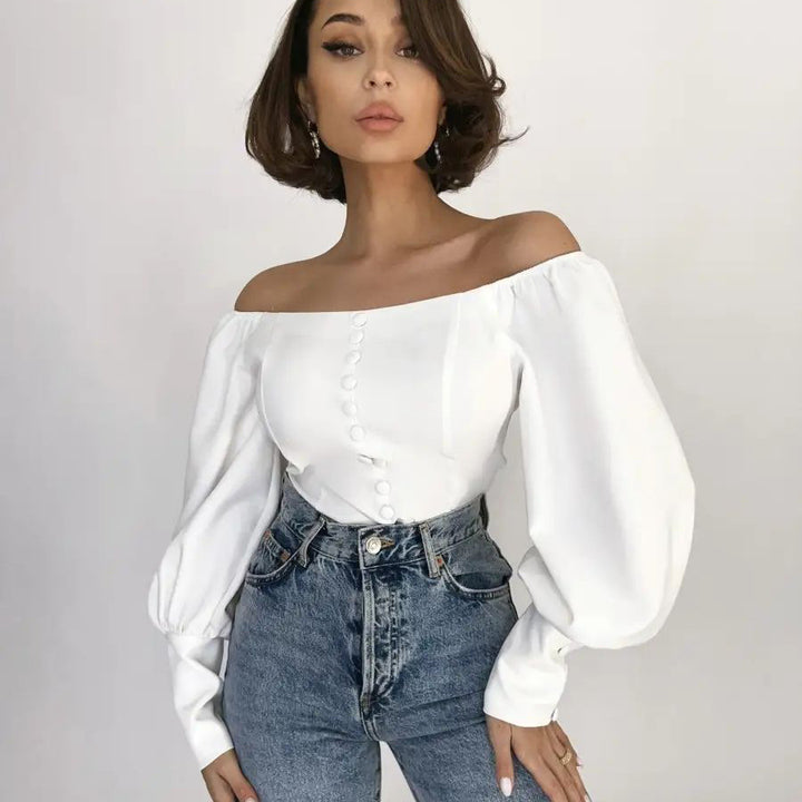 Dame Off-Shoulder Bluse med elegante puffærmer og knapdetaljer Stilla