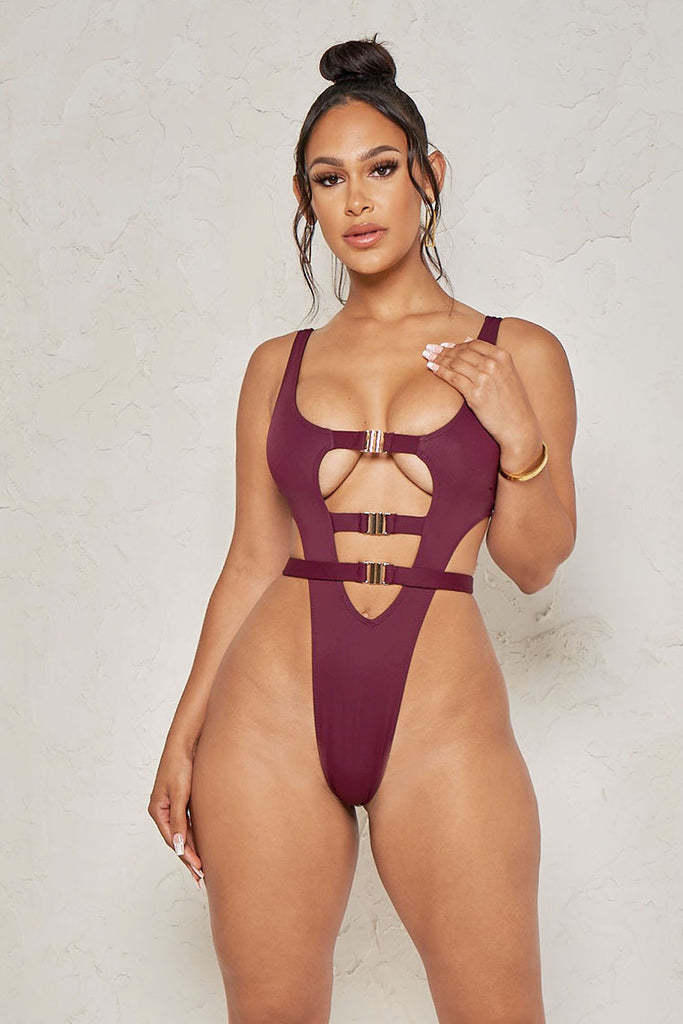 Dame en-delet badedragt med cut-out design og gyldne accenter Stilla