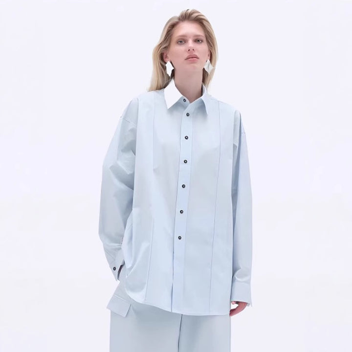 Kvindernes langærmede bluse med moderne snit og elegante detaljer Stilla