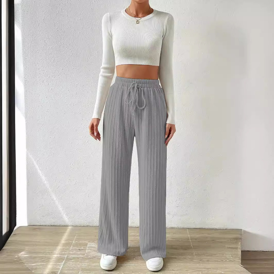 Dame afslappet lounge-sæt med strækbart crop-top og bløde palazzo-bukser Stilla