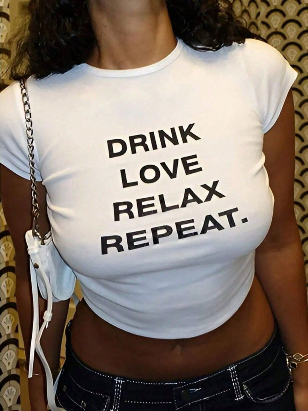 Dame Crop-T-shirt med inspirerende tekst og afslappet snit Skovae