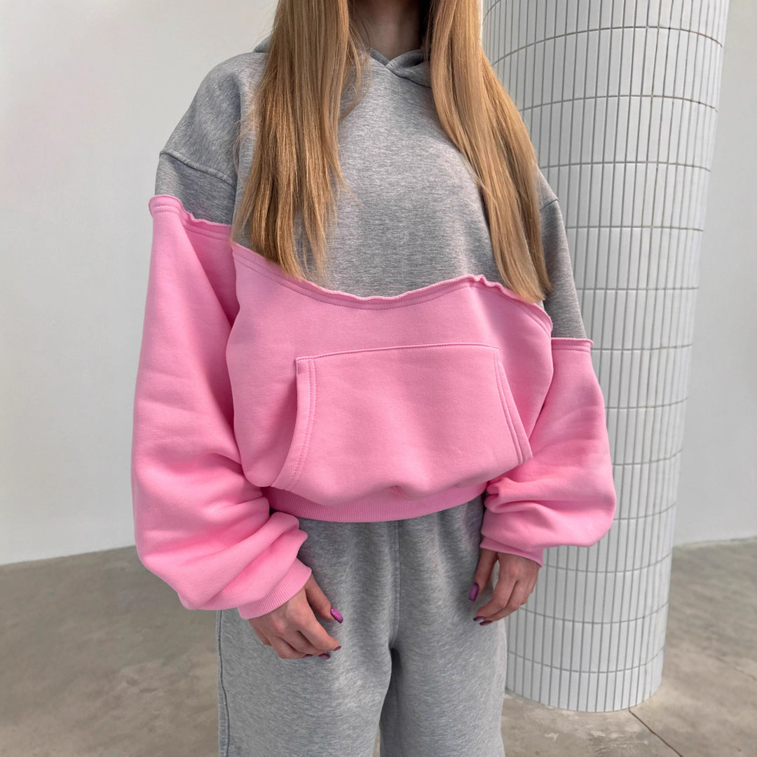 Kvinders fashionable sweatsuit med kontrasterende elementer