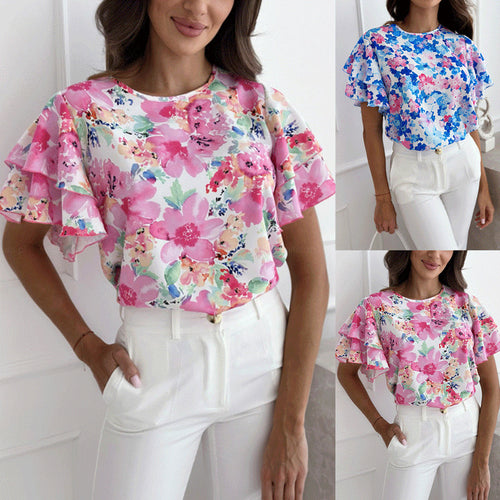 Damebluse med voluminøse flæseærmer og blomstermotiv Stilla
