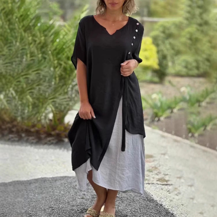 Dame Strandkjole med asymmetrisk snit og elegante knapdetaljer Stilla