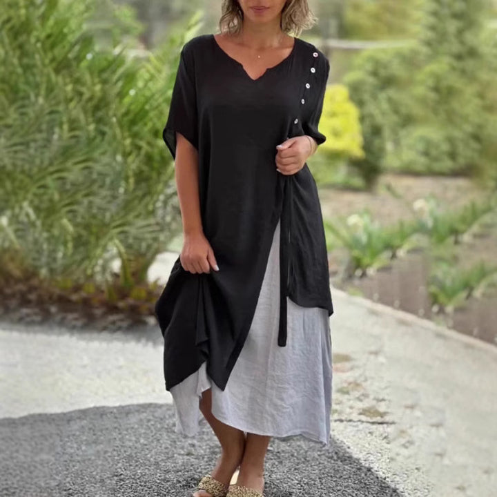 Dame Strandkjole med asymmetrisk snit og elegante knapdetaljer Stilla