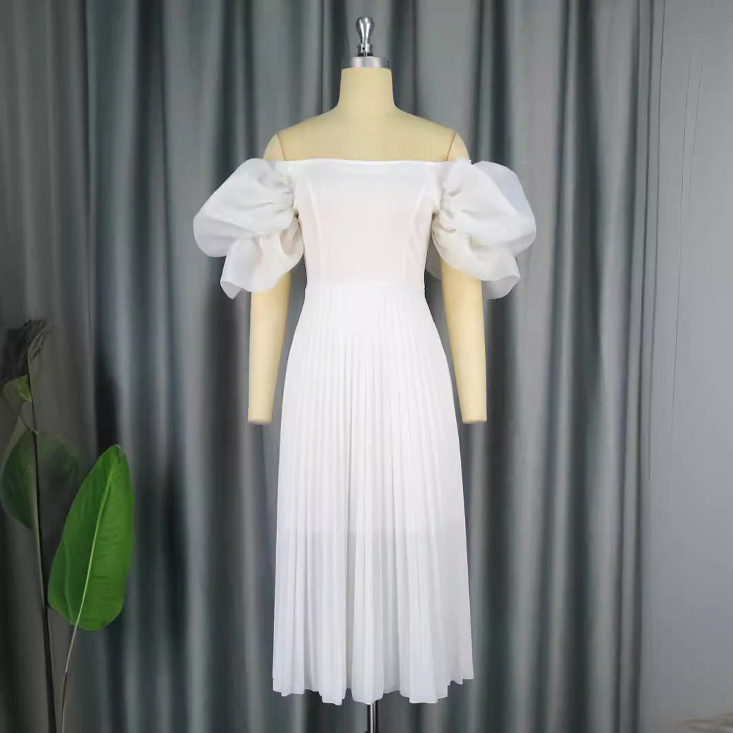 Damer Elegant kjole med voluminøse puffærmer og svingende skørt Skovae