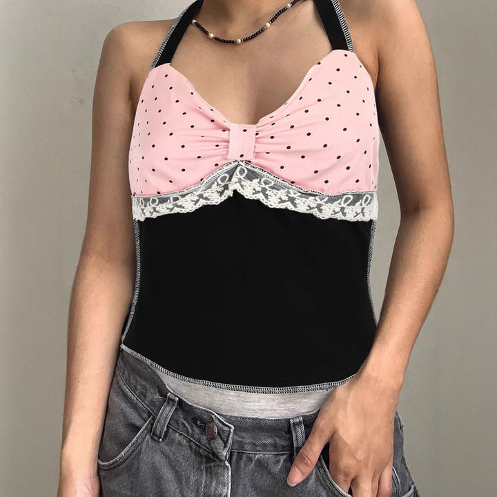 Dame halterneck top med romantisk spidsdetalje og elegant polka-dot mønster Skovae
