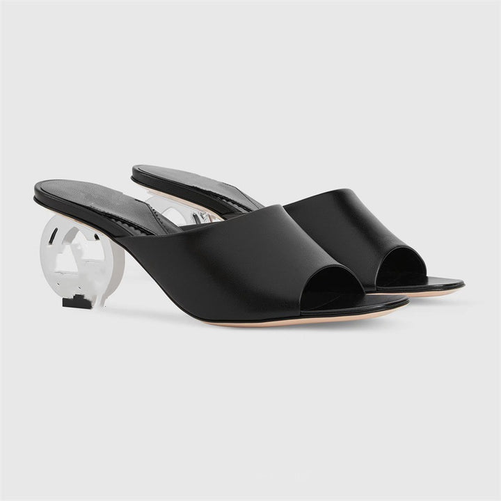 Femme Open-Toe Mules med skulpturel hældesign Stilla