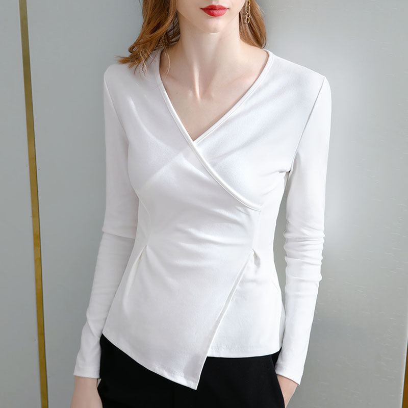 Dame langærmet kimono-top med elegant snit og figurskabende design Stilla