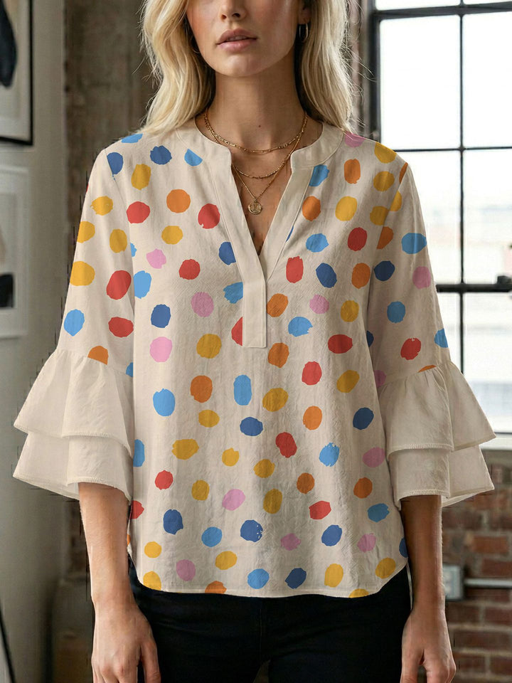 Dame bluse med voluminøse ærmer og kreativt trykdesign Skovae