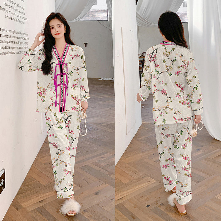 Dame modernt pyjamasæt med tropisk print og komfortdetaljer Stilla