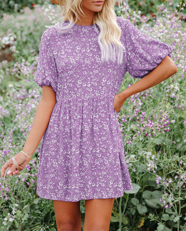 Dame sommerkjole med elegante puffærmer og blomstermønster Stilla