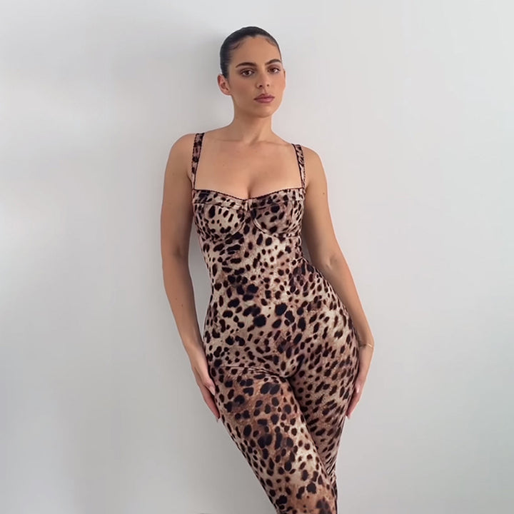 Dame jumpsuit med raffineret slangeskinds-design og figursyet snit Skovae