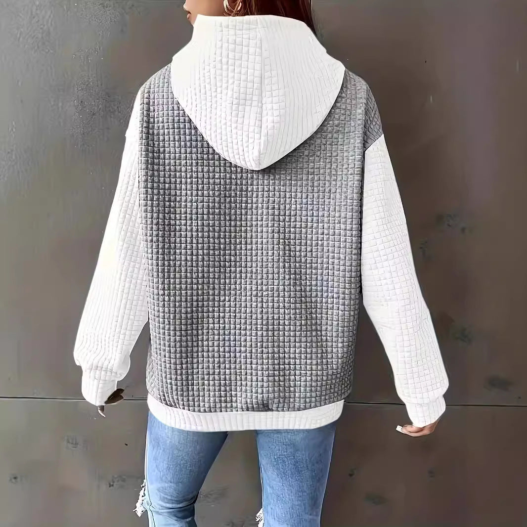 Dame hoodie med struktureret design og praktiske lommer Stilla