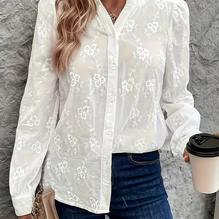 Dame Bluse med floral broderi og elegante pufærmer Stilla