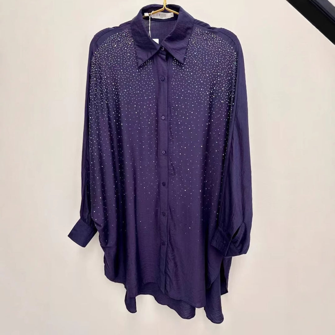 Damebluse med glitrende detaljer og afslappet pasform Stilla